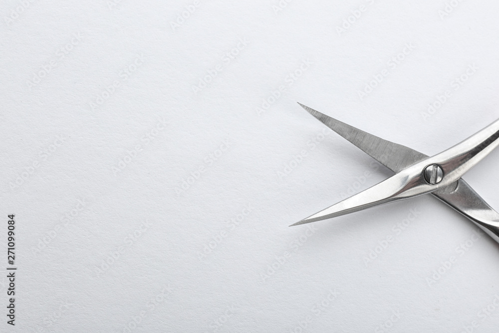 Pair of nail scissors on white background, closeup Pair of nail scissors on white background, closeup