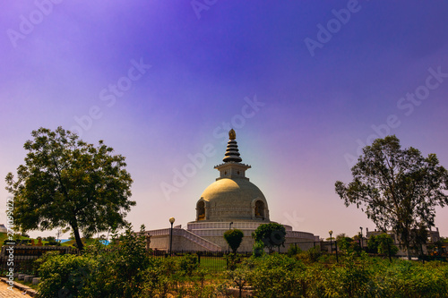 4 May 2019; an Indian landmark - Vishwa Shanti Stupa, also known as the World Peace Pagoda on a blue sky background at midday, New Delhi, India.