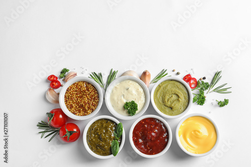 Wallpaper Mural Composition with different sauces and ingredients on white background, flat lay. Space for text Torontodigital.ca