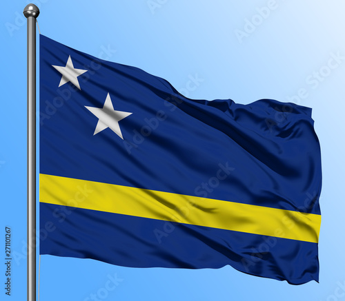 Curacao flag waving in the deep blue sky background. Isolated national flag. Macro view shot.