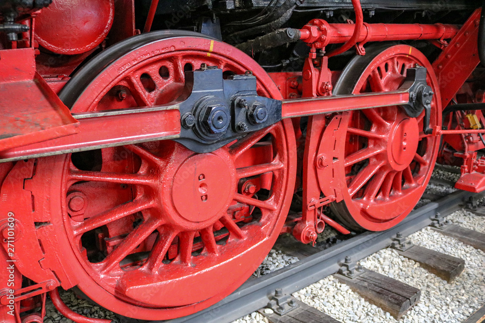 Red wheels of a steam locomotive, Speyer, Germany