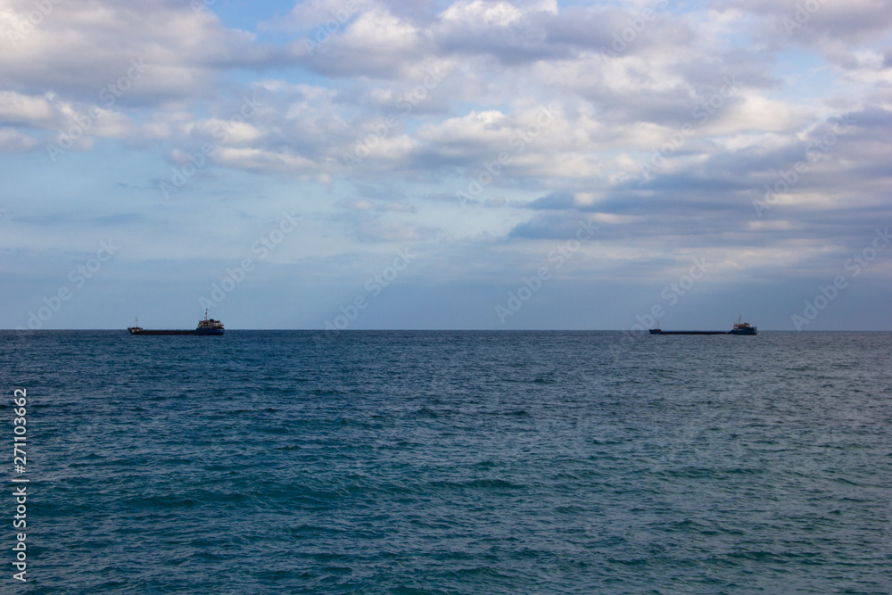 sea ​​and sky and barges