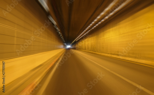 Speed motion on the road in tunnel Orange and motion streaks,blur and movement,copy space