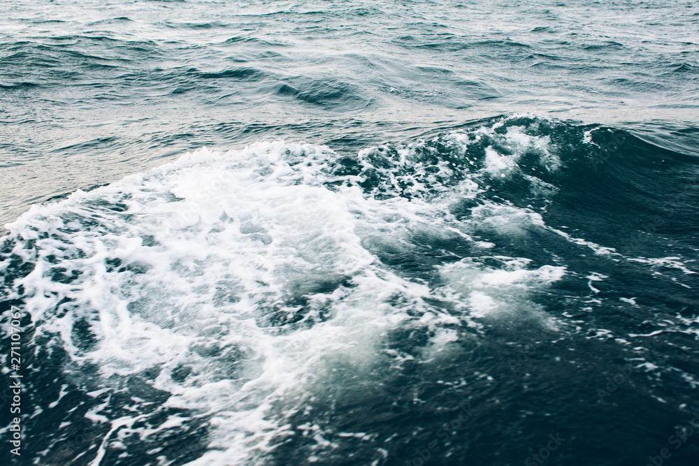 dark blue sea water background, shades of blue in black sea