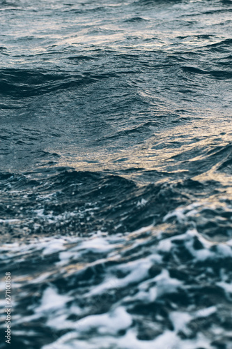 dark blue sea water background, shades of blue in black sea © Дарья Фомина