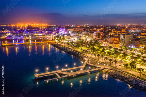 Limassol. Republic of Cyprus night panorama. Night Molos embankment. Limassol's promenade protruding into the sea from height. The mediterranean seaside. The Cyprus beaches. Traveling to the Cyprus. © Grispb
