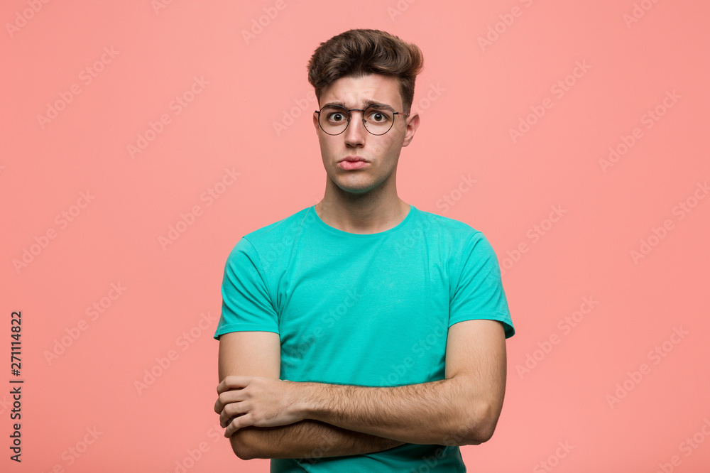 Young cool caucasian man unhappy looking in camera with sarcastic expression. Young cool caucasian man unhappy looking in camera with sarcastic expression.