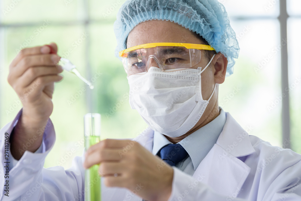 Asian senior scientist have teaching young student scientist in a laboratory. Asian senior scientist have teaching young student scientist in a laboratory.