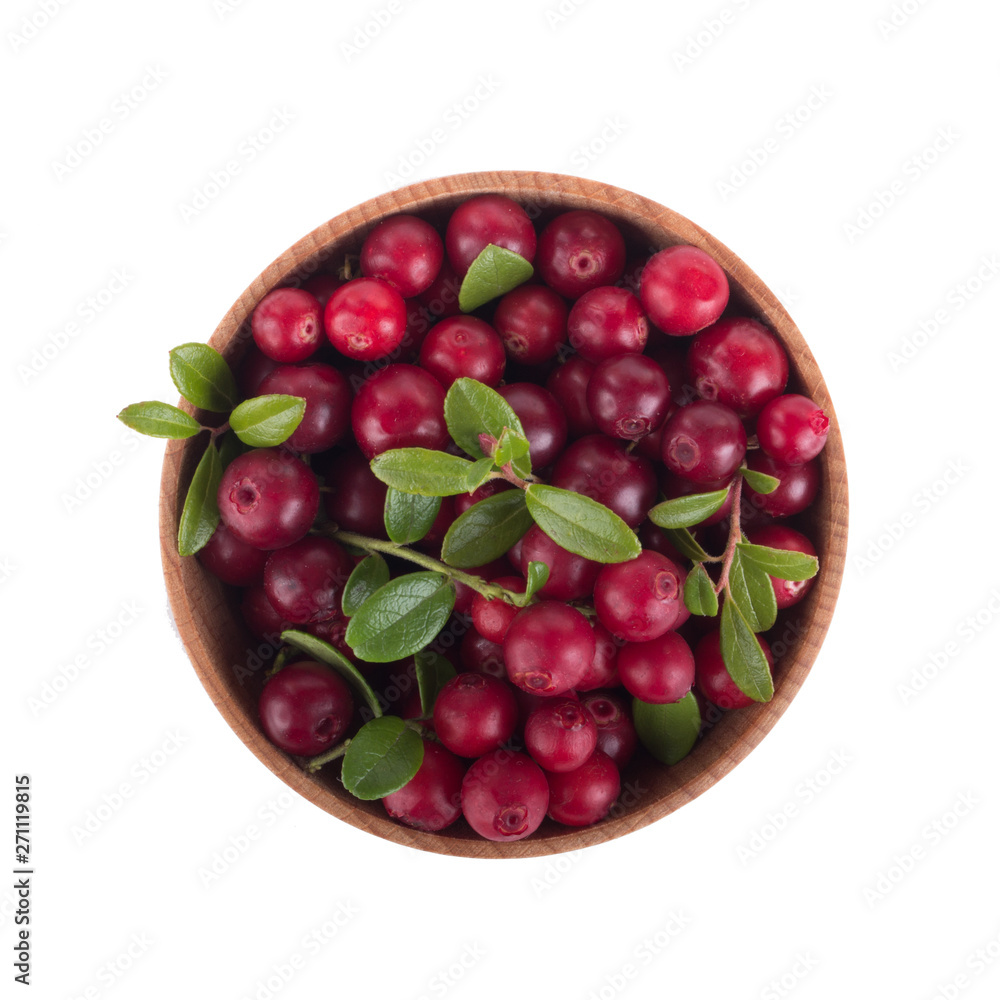 fresh red cowberry in wooden cup isolated on white background fresh red cowberry in wooden cup isolated on white background