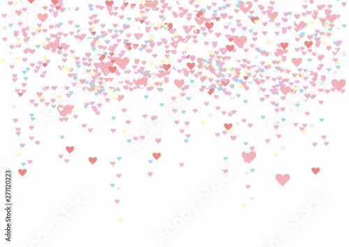 multicolored sequins serpentine in the form of heart piled on a transparent background