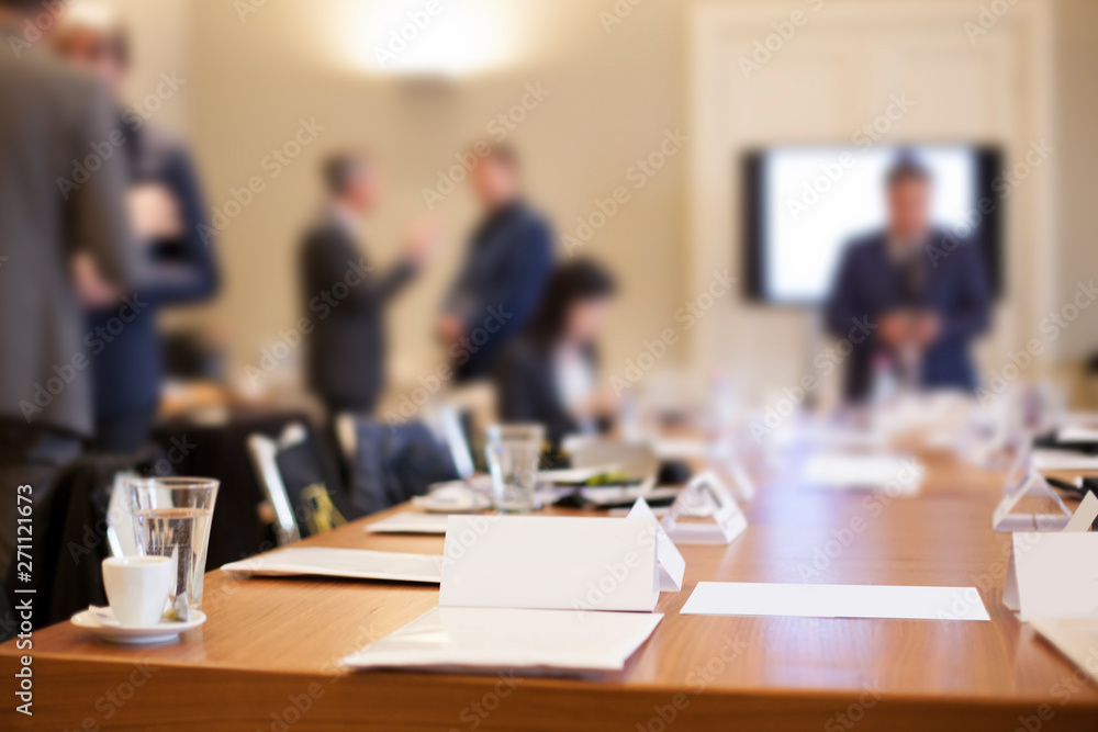 businesspeople around the table in conference room - obrazy, fototapety, plakaty 