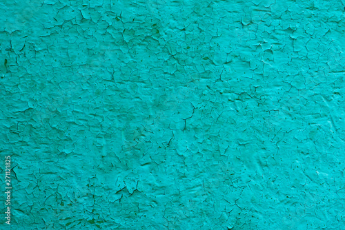 Unicolorous painted cracked wall texture. Background