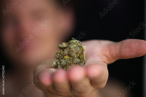 dry medical cannabis marijuana hand © Elroi