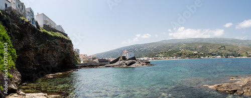 Agia Thalassini Church in a rock at the sea in Chora of Andros island, Cyclades Greece photo