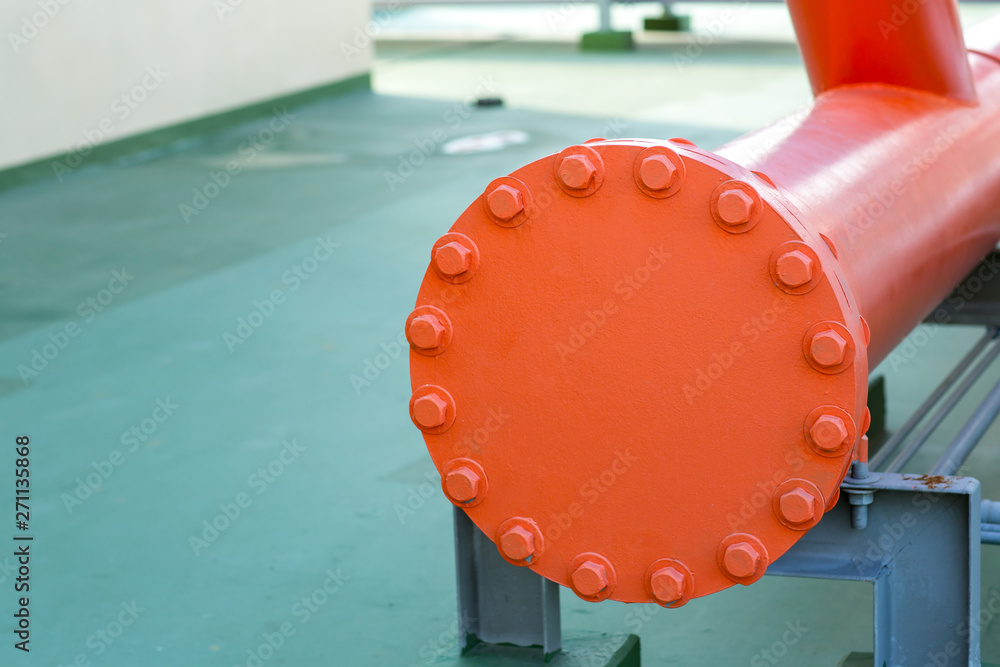A Metal Pipe With A Blank Flange Shutting Off The End Water Steel a-metal-pipe-with-a-blank-flange-shutting-off-the-end-water-steel