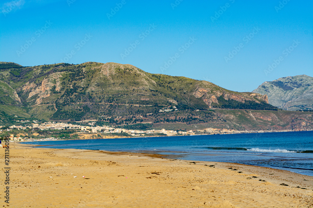 Coastline with sandy beach and clear sea water in Alcamo Marina, small town in Sicily, Italy, summer vacation destination