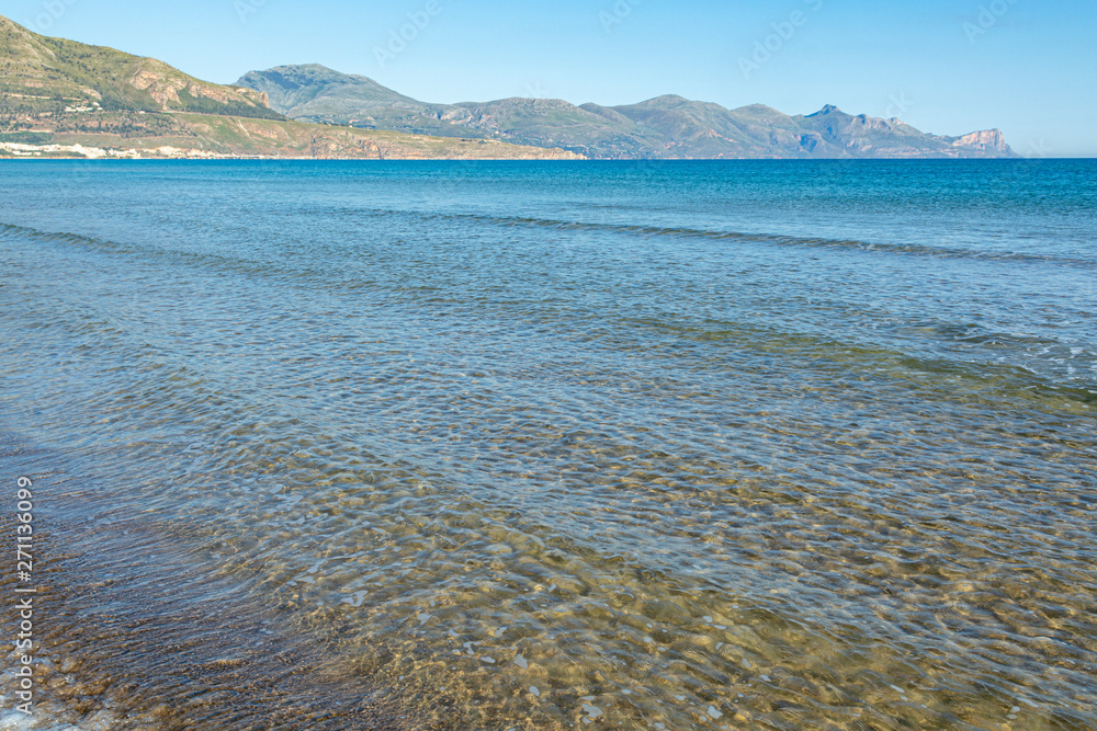 Coastline with sandy beach and clear sea water in Alcamo Marina, small town in Sicily, Italy, summer vacation destination