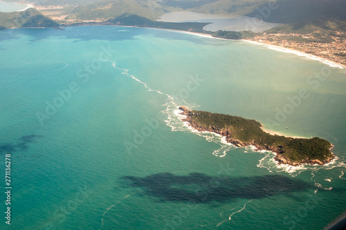 aerial view of sea and rocks on beach in Santa Catarina State, south of Brazil