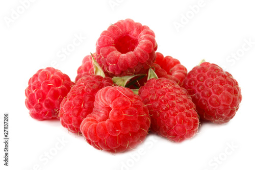 heap of red raspberries isolated on white background