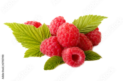 heap of red raspberries with green leaves isolated on white background