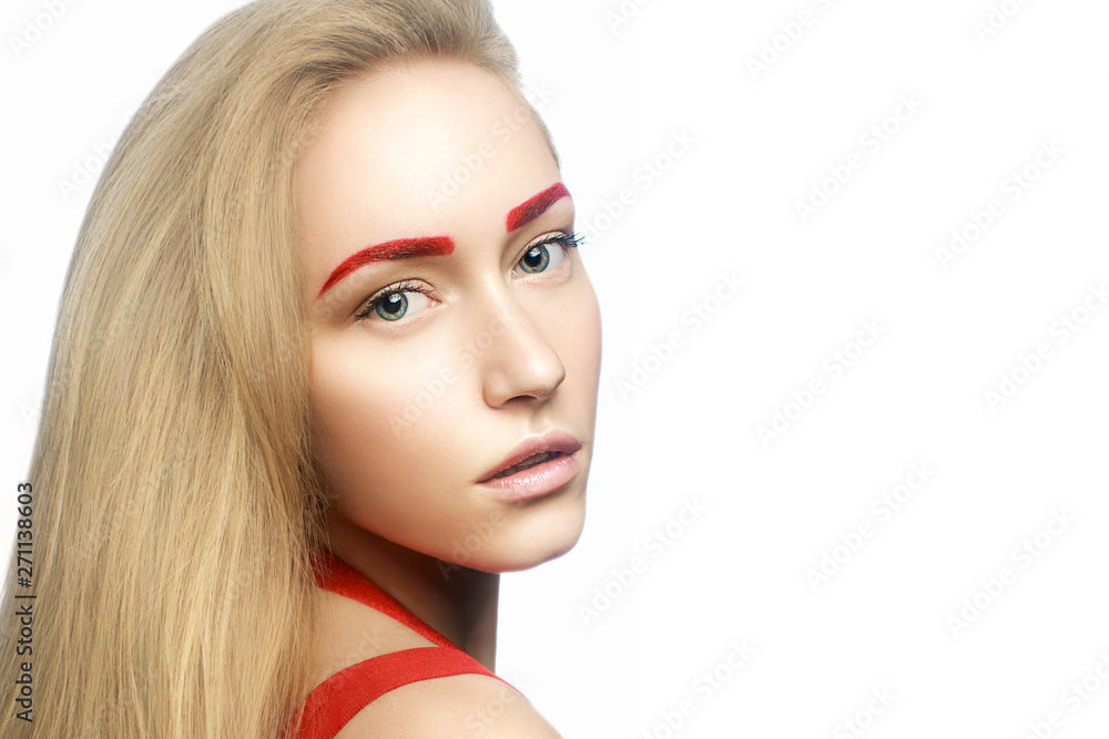 Obraz premium Portrait of a beautiful young woman with healthy long hair and stylish modern makeup