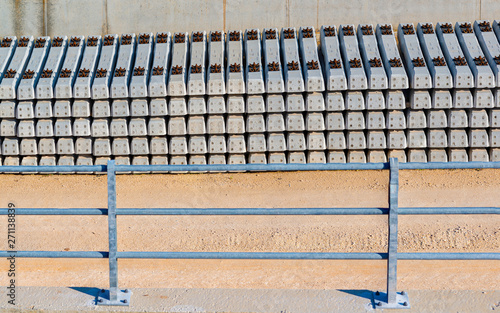 Pile of precast concrete sleepers ready for construction in trackwork photo