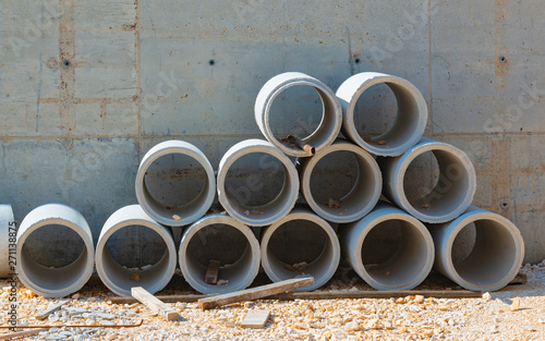 Concrete drainage pipes for industrial building construction.