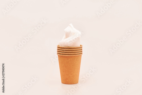 coffee to go in a disposable cup on a white background, ice cream concept, eco friendly cup