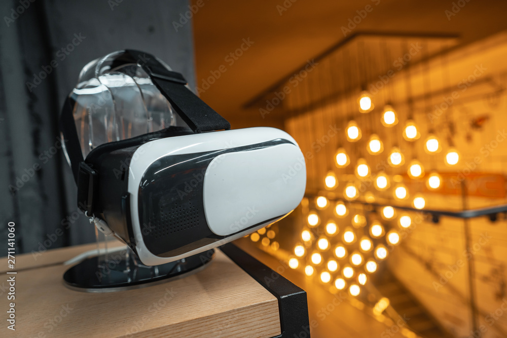 Virtual reality helmet on a stand