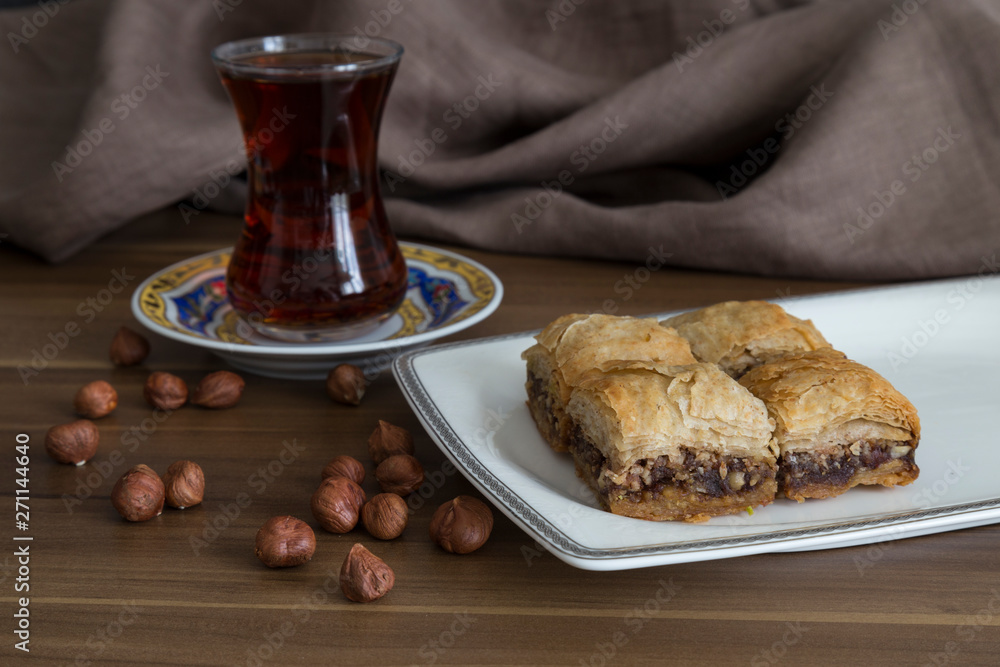 Turkish style vegan baklava or Antep baklava with nut,date fruit, pistachio for presentation and service and food photography. 