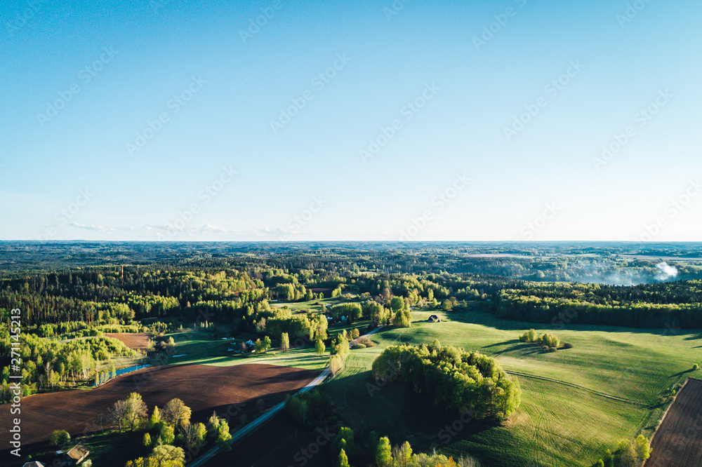 Aerial view on rural countryside scenery, summer time in Latvian countryside. 