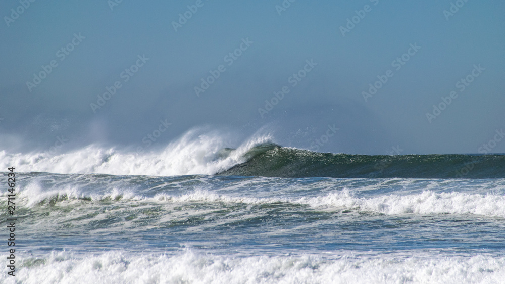 Fototapeta premium Atlantic ocean waves breaking onto beach in Agadir, Morocco