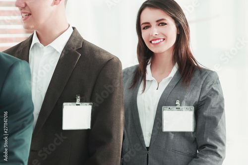 Obraz na płótnie group of business people with blank badges w salonie
