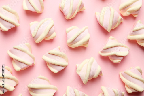 Abstract composition of marshmallows on a pink background. Top view