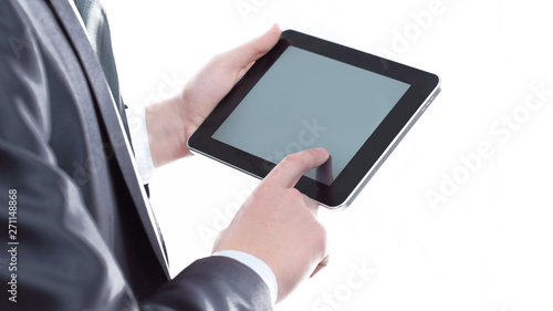 close up.businessman tapping the screen of the digital tablet