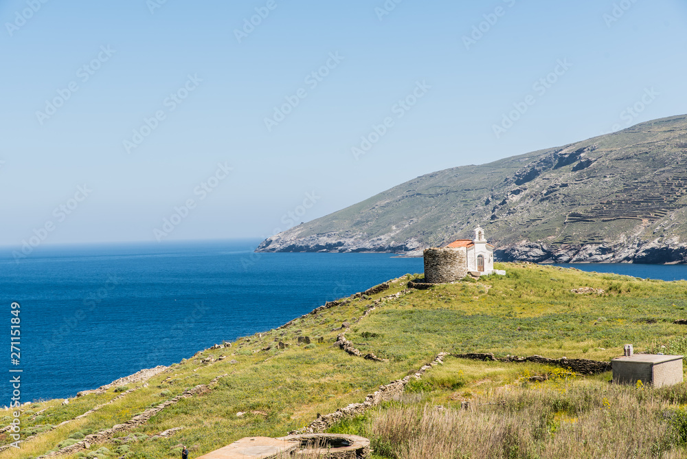 An old orthodox church in a hill next to Korthi of Andros, Cyclades, Greece