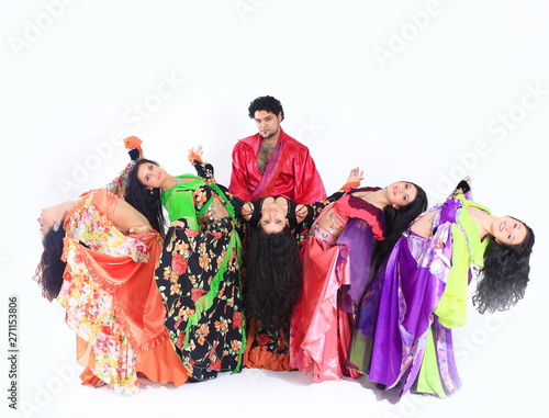 professional dance troupe of Gypsies in traditional dress performs folk dance