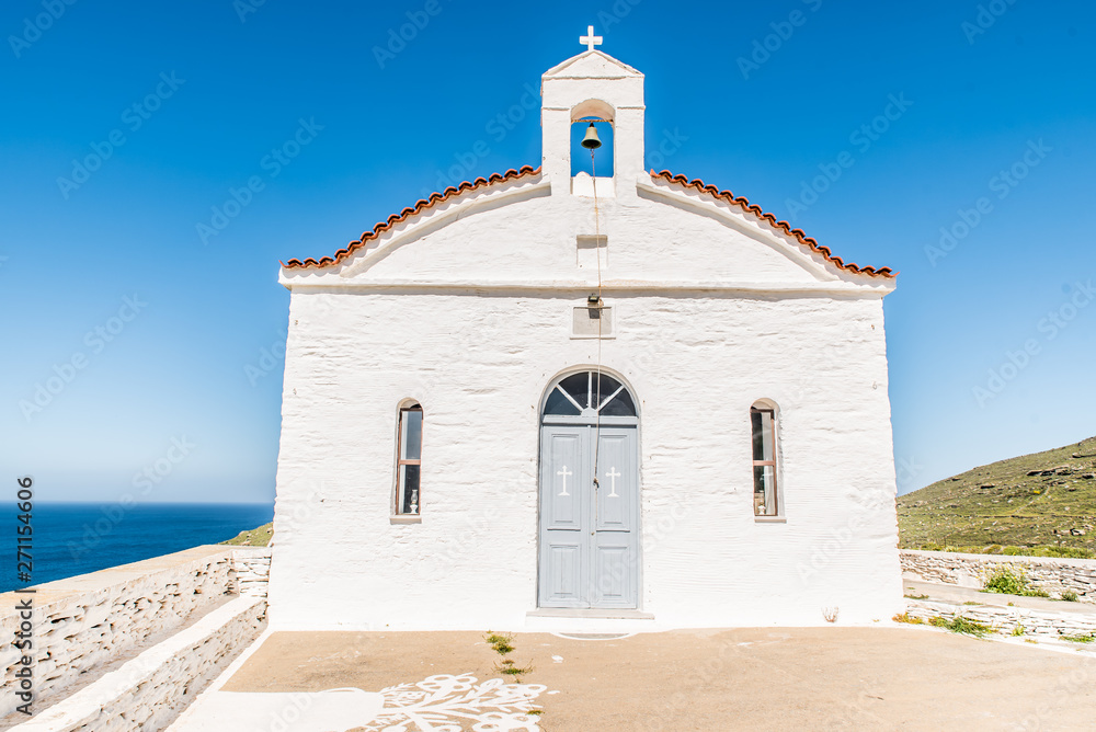 An old orthodox church in a hill next to chora of Andros, Cyclades, Greece