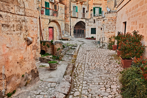 Fototapeta Naklejka Na Ścianę i Meble -  Matera, Basilicata, Italy: ancient alley in the old town called Sassi di Matera