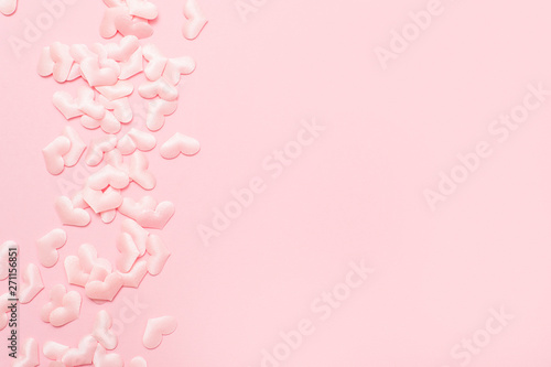 Elements in shape of heart flying on pink background. symbols of love for Happy Women's, Mother's, Valentine's Day © Augustas Cetkauskas