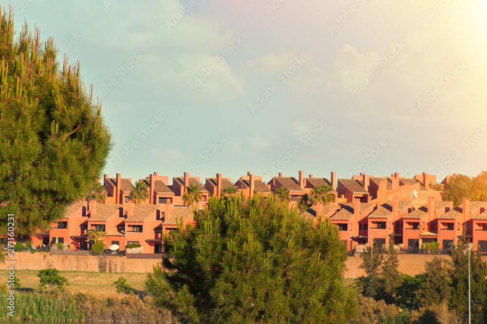Φωτογραφία Huge residential area of two-storey houses with a large Park and a lake