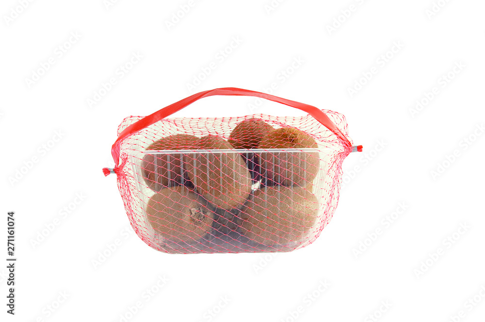 Kiwi in a plastic tray in the grid. Packaging for sale. White isolate