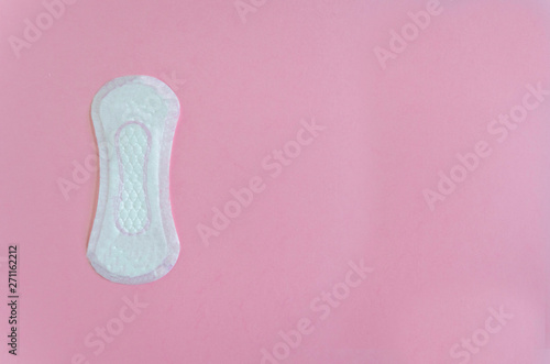Daily female gasket on pink background. copy space.