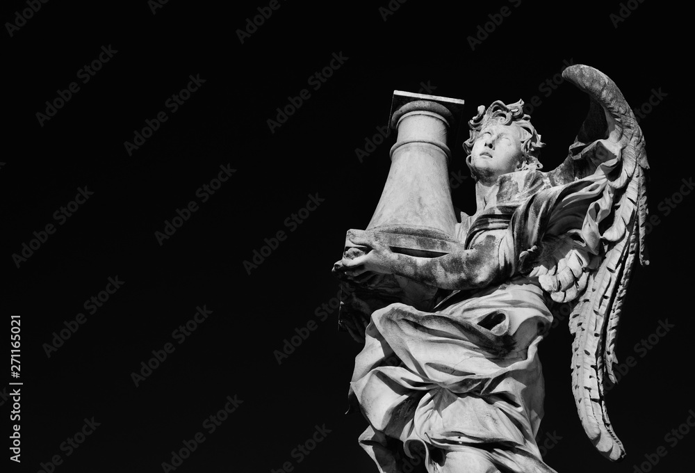 Angel statue holding the Column of Jesus Passion looks at the Heaven A 17th century baroque masterpiece at the top of Sant'Angelo Bridge in the center of Rome (Black and White with copy space)