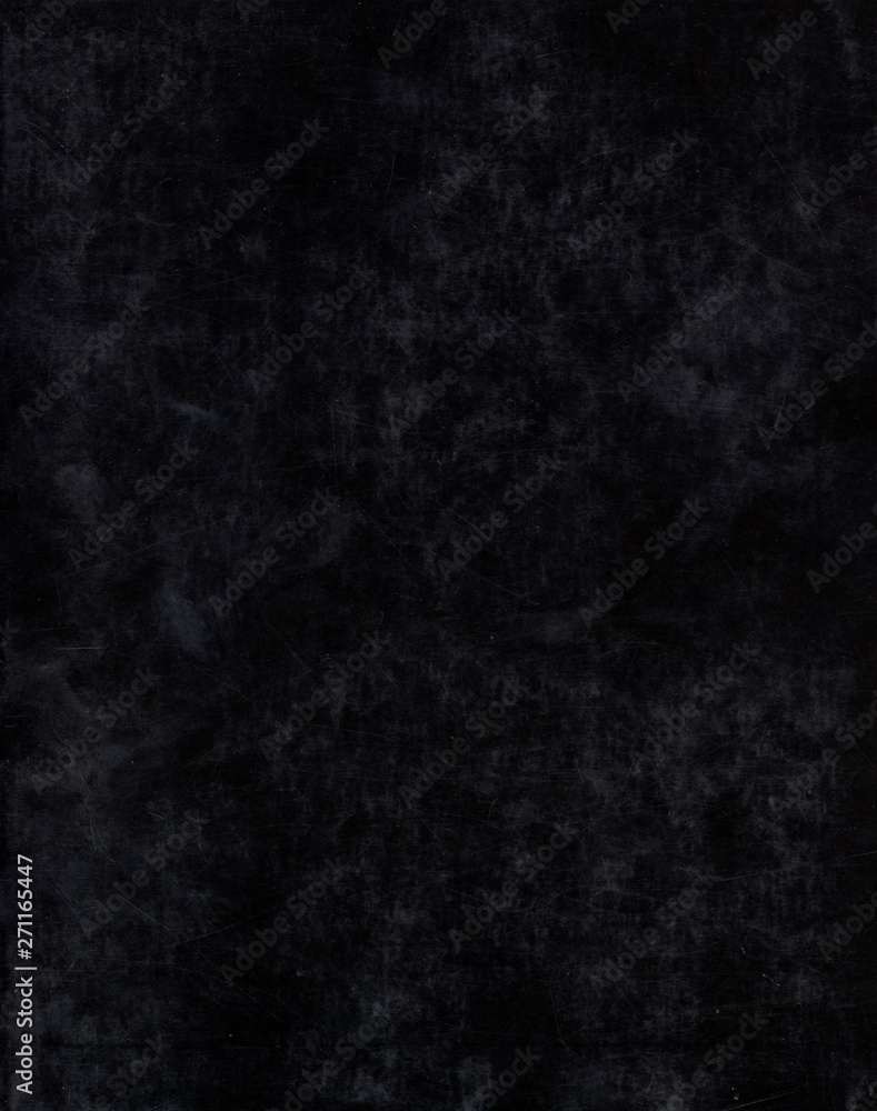 Old black paper texture. Rough faded surface. Blank retro page. Empty place for text. Perfect for background and vintage style design.
