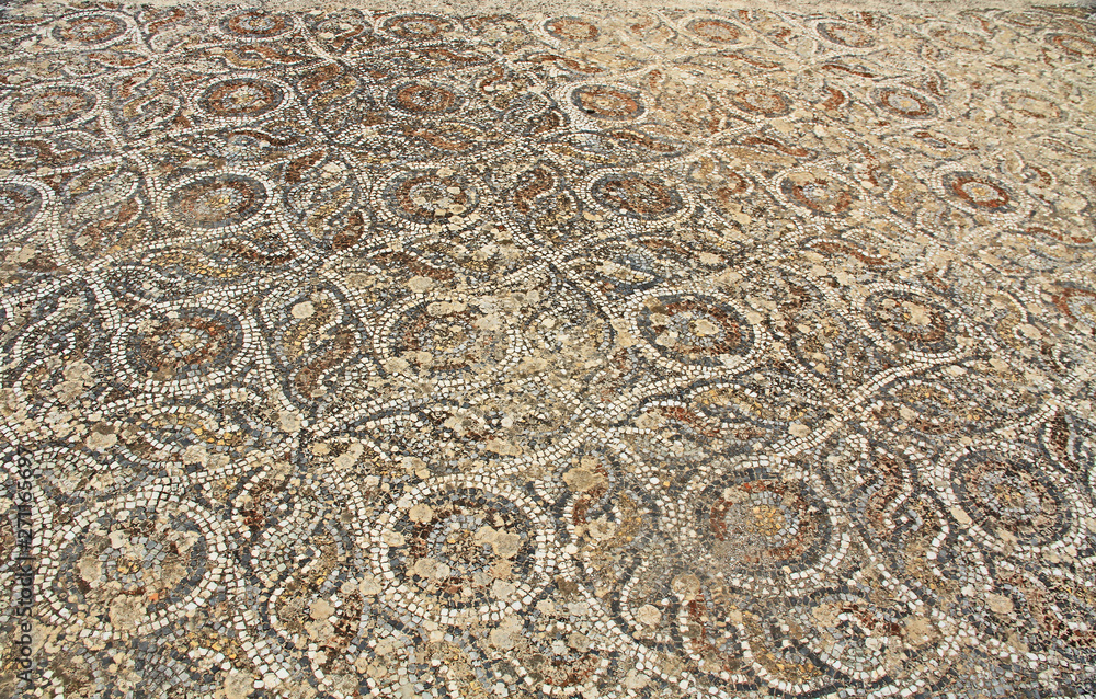 Mosaic tile floor along the Curetes Road in the ancient city ruins of Ephesus, Turkey near Selcuk. Mosaic tile floor along the Curetes Road in the ancient city ruins of Ephesus, Turkey near Selcuk.