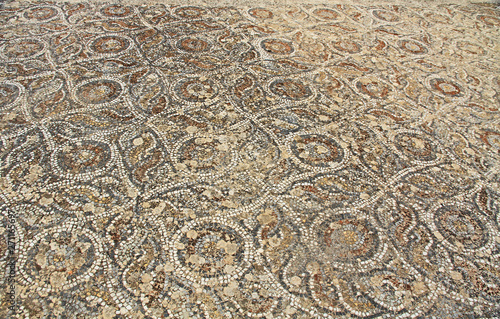 Mosaic tile floor along the Curetes Road in the ancient city ruins of Ephesus, Turkey near Selcuk. photo