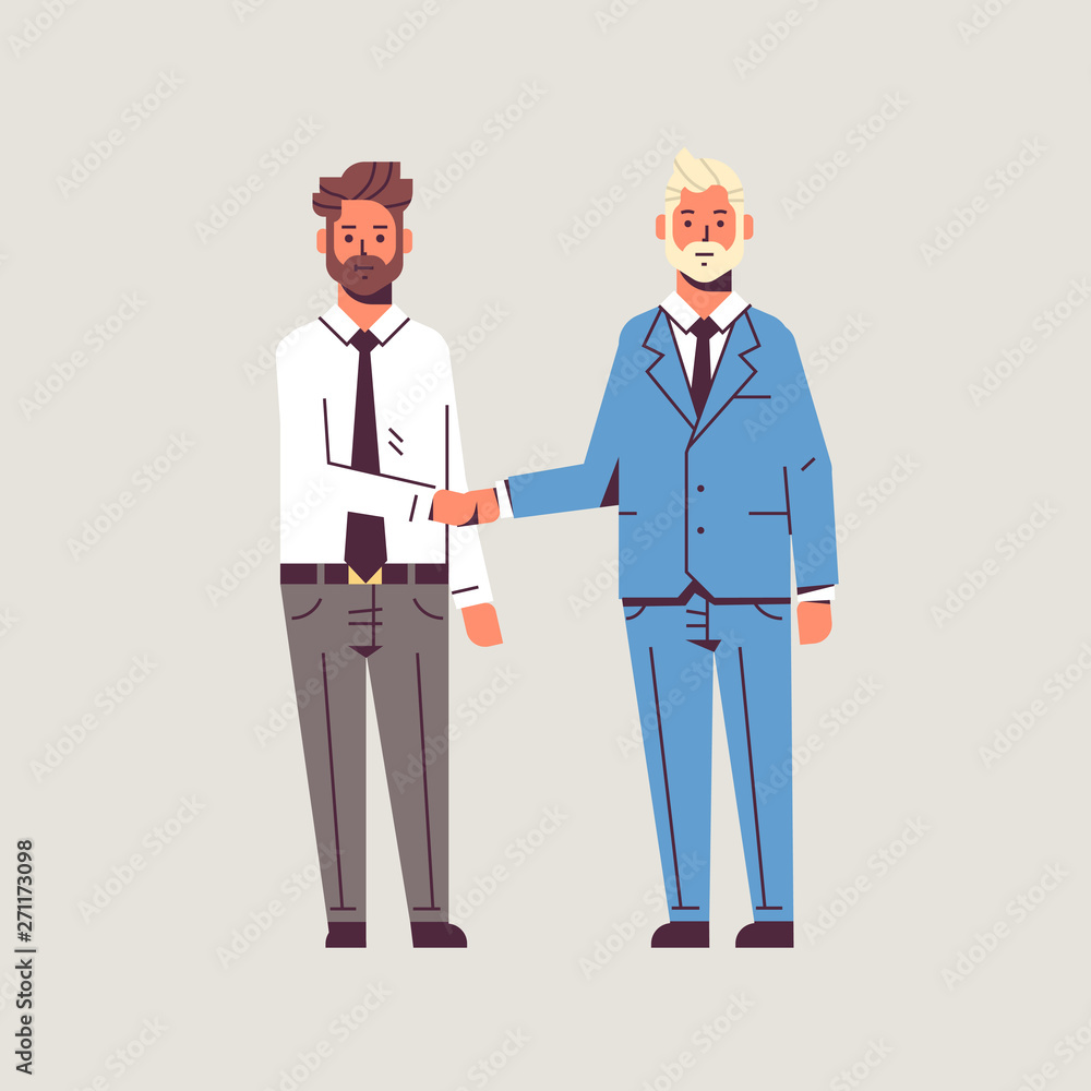 couple businessmen handshaking business partners hand shake during meeting agreement partnership concept male colleagues in formal wear standing together flat full length couple businessmen handshaking business partners hand shake during meeting agreement partnership concept male colleagues in formal wear standing together flat full length