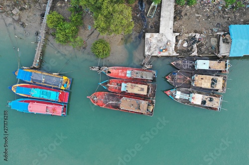 Traditional fishing boats in harbour in Southeast Asia. Aerial photo  © Richard Carey