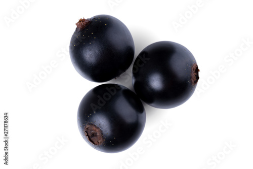 Ripe blackcurrant isolated on a white background. Black berries. Delicious and healthy food. Top view